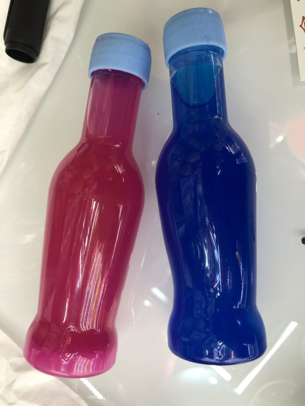 Красочный слайм в бутылке от производителя